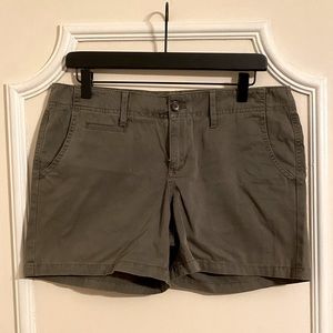 Army green shorts.  5”